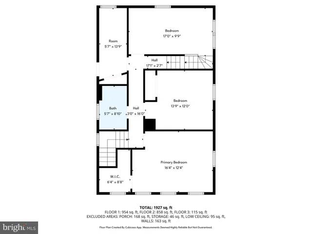 a picture of a bench in front of a wall