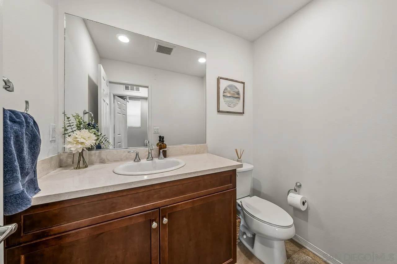 2710 Sparta Road, Unit 1 Chula Vista, CA 91915 - Photo 20 of 45 a bathroom with a sink toilet and mirror