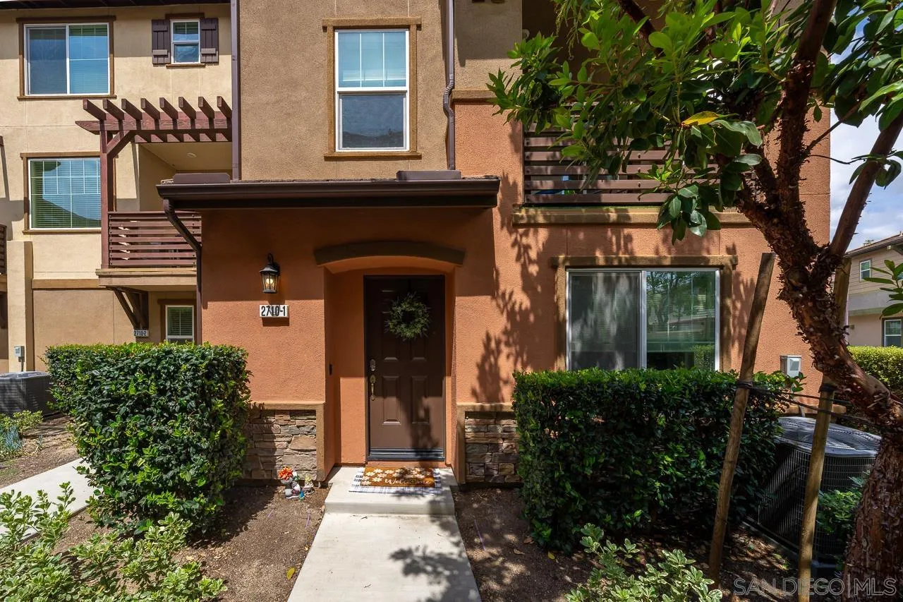 2710 Sparta Road, Unit 1 Chula Vista, CA 91915 - Photo 2 of 45 front view of a house with a tree