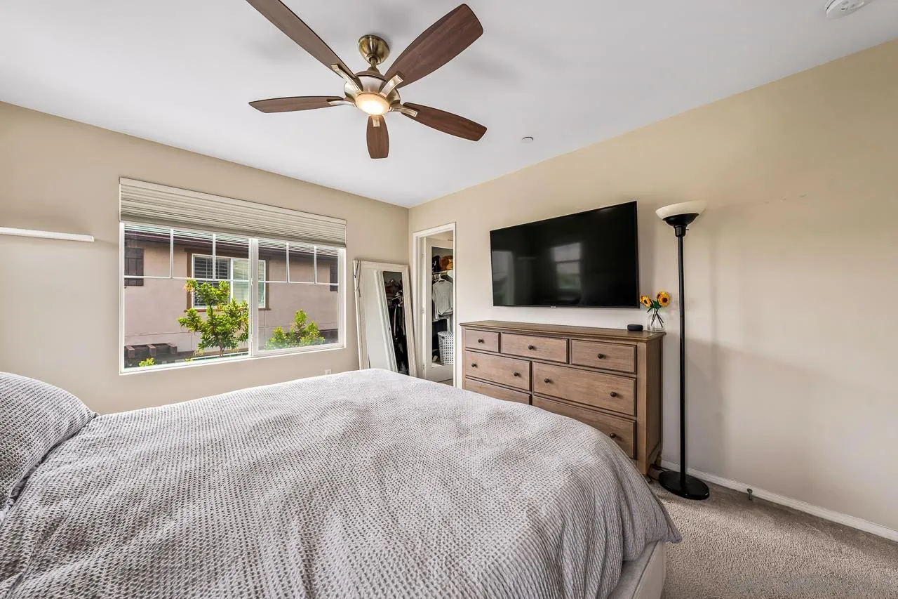 2710 Sparta Road, Unit 1 Chula Vista, CA 91915 - Photo 29 of 45 a bedroom with a bed and a flat screen tv