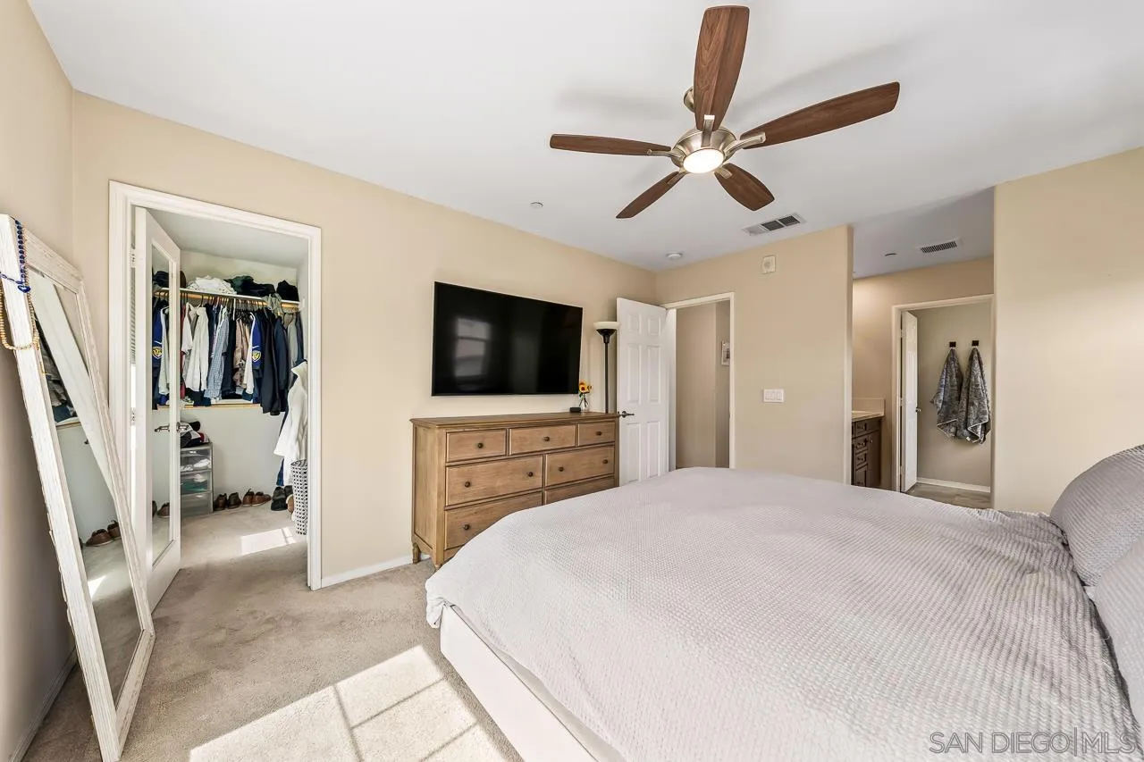 2710 Sparta Road, Unit 1 Chula Vista, CA 91915 - Photo 31 of 45 a bedroom with a bed and a flat tv screen on dresser