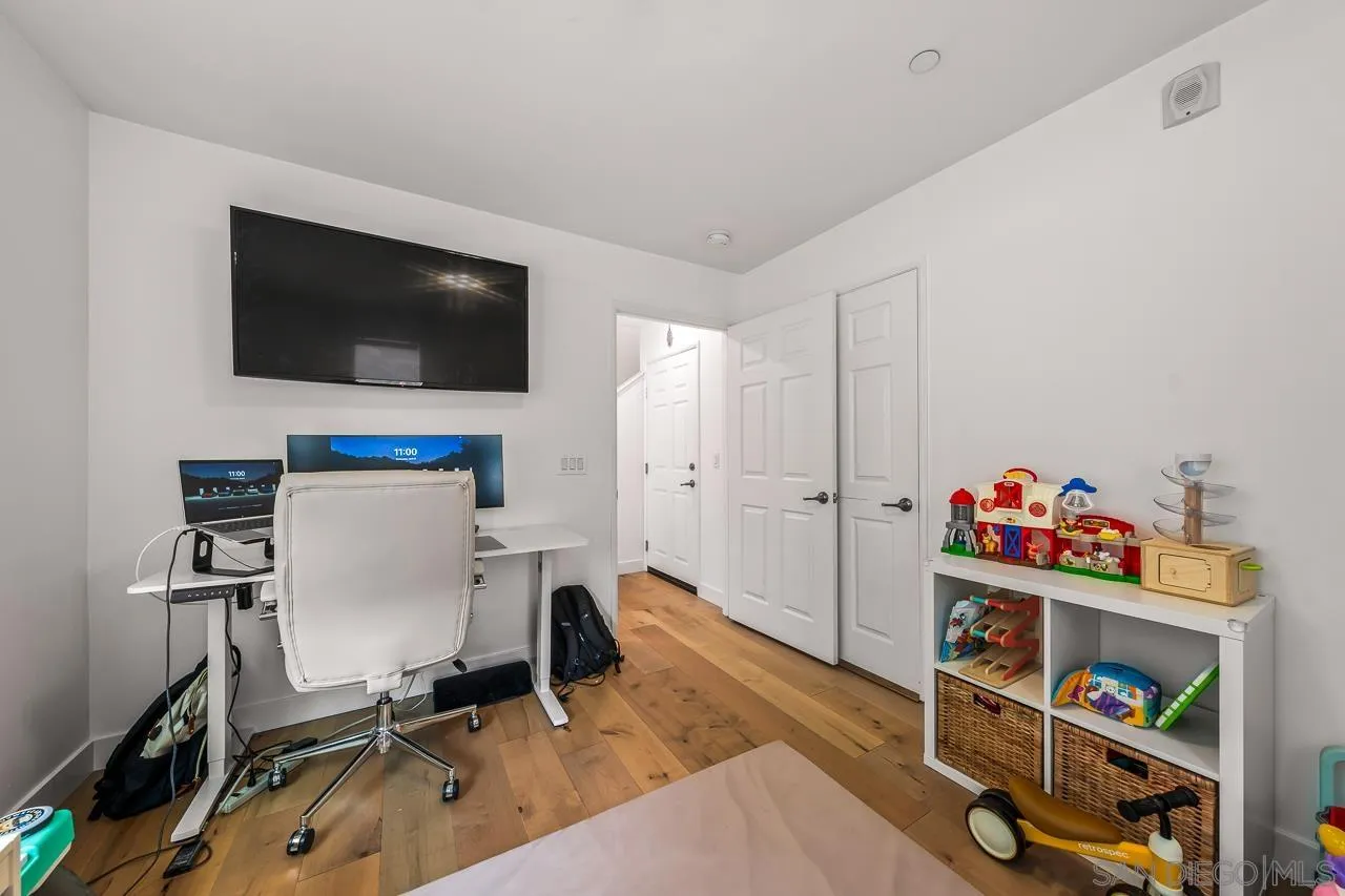 2710 Sparta Road, Unit 1 Chula Vista, CA 91915 - Photo 36 of 45 a view of a workspace with furniture and a flat screen tv