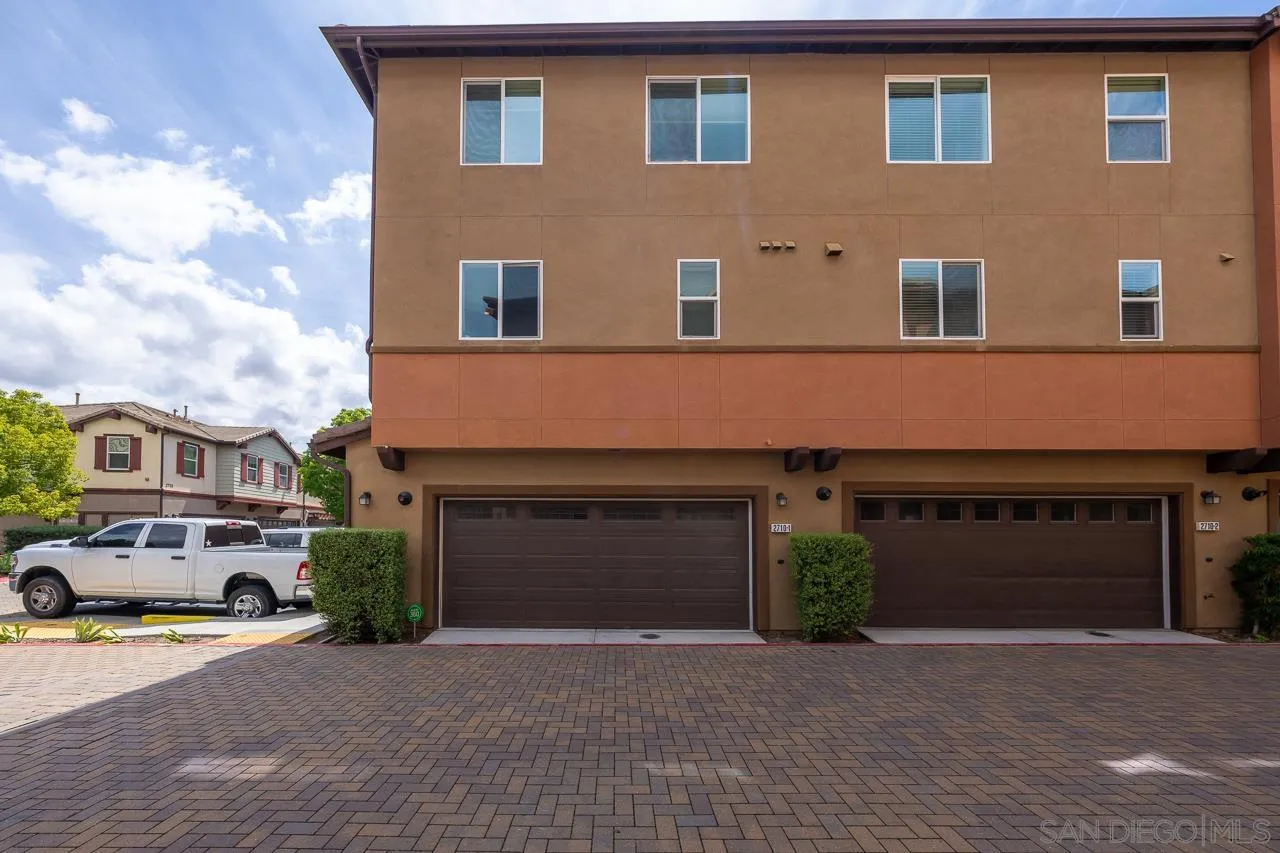 2710 Sparta Road, Unit 1 Chula Vista, CA 91915 - Photo 6 of 45 a front view of a house with a yard and garage