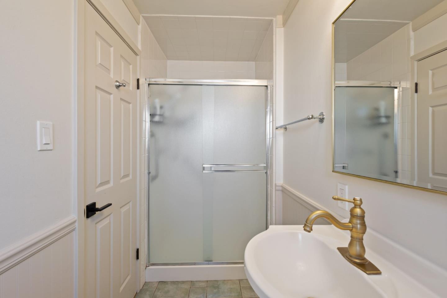 3959 Purdue Way Livermore, CA 94550 - Photo 13 of 19 a bathroom with a sink and shower