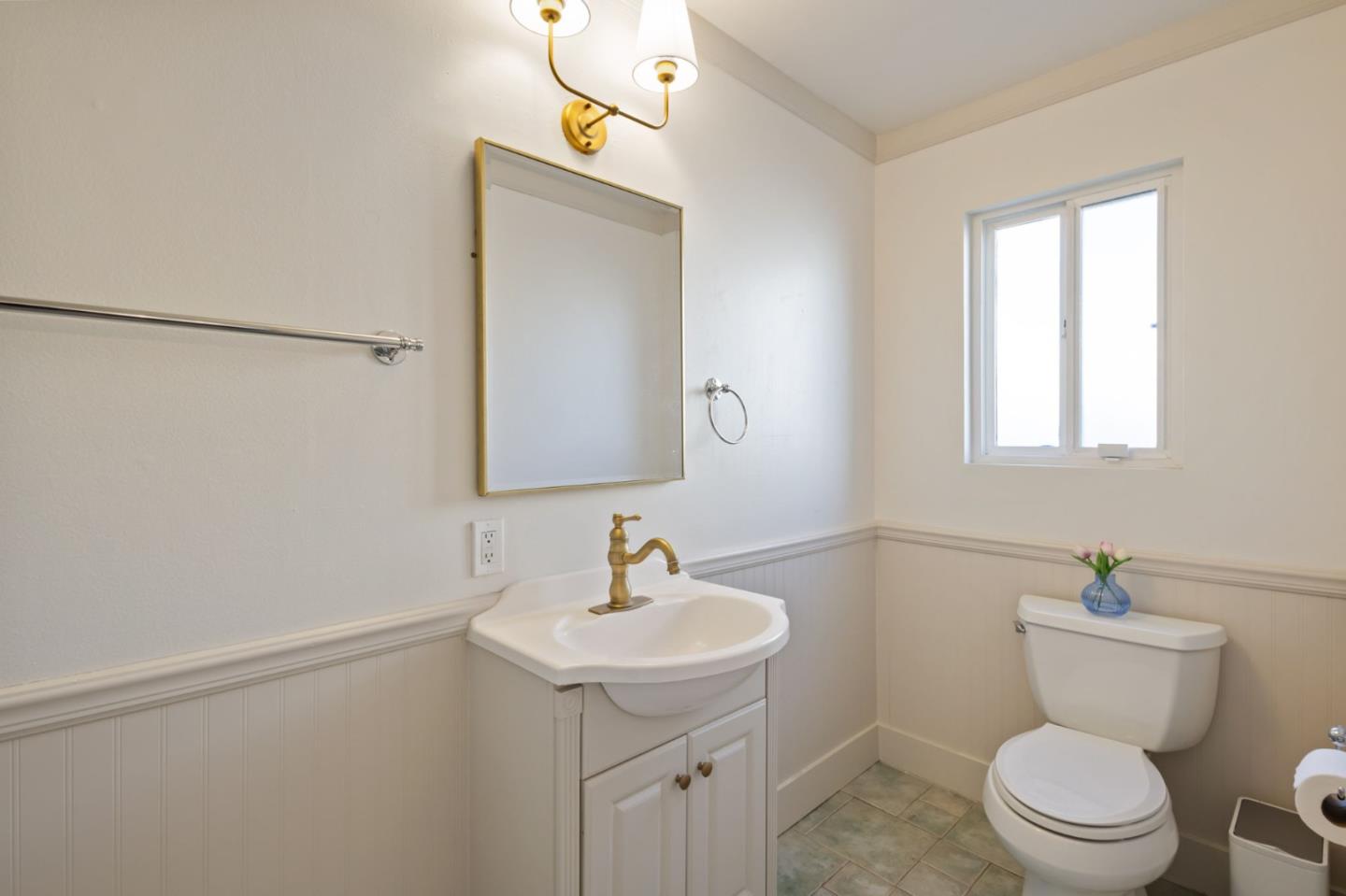 3959 Purdue Way Livermore, CA 94550 - Photo 14 of 19 a bathroom with a toilet a sink and mirror