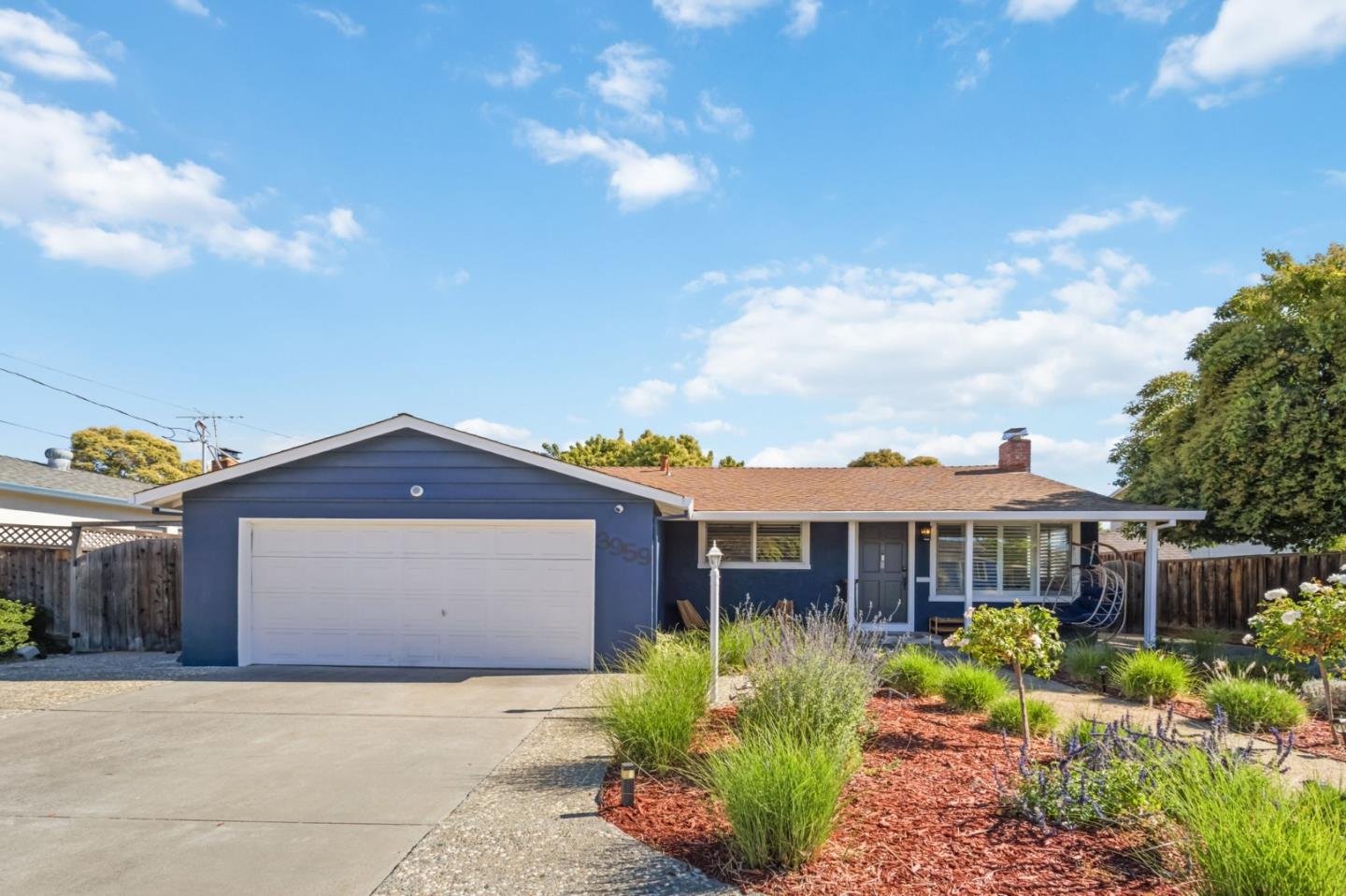 3959 Purdue Way Livermore, CA 94550 - Photo 2 of 19 a front view of a house with a yard and garage