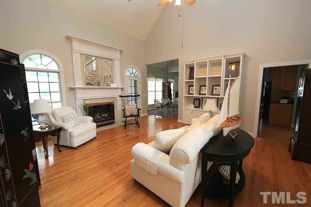 501 Competition Road Raleigh, NC 27603 - Photo 3 of 24 a living room with furniture fireplace and a window