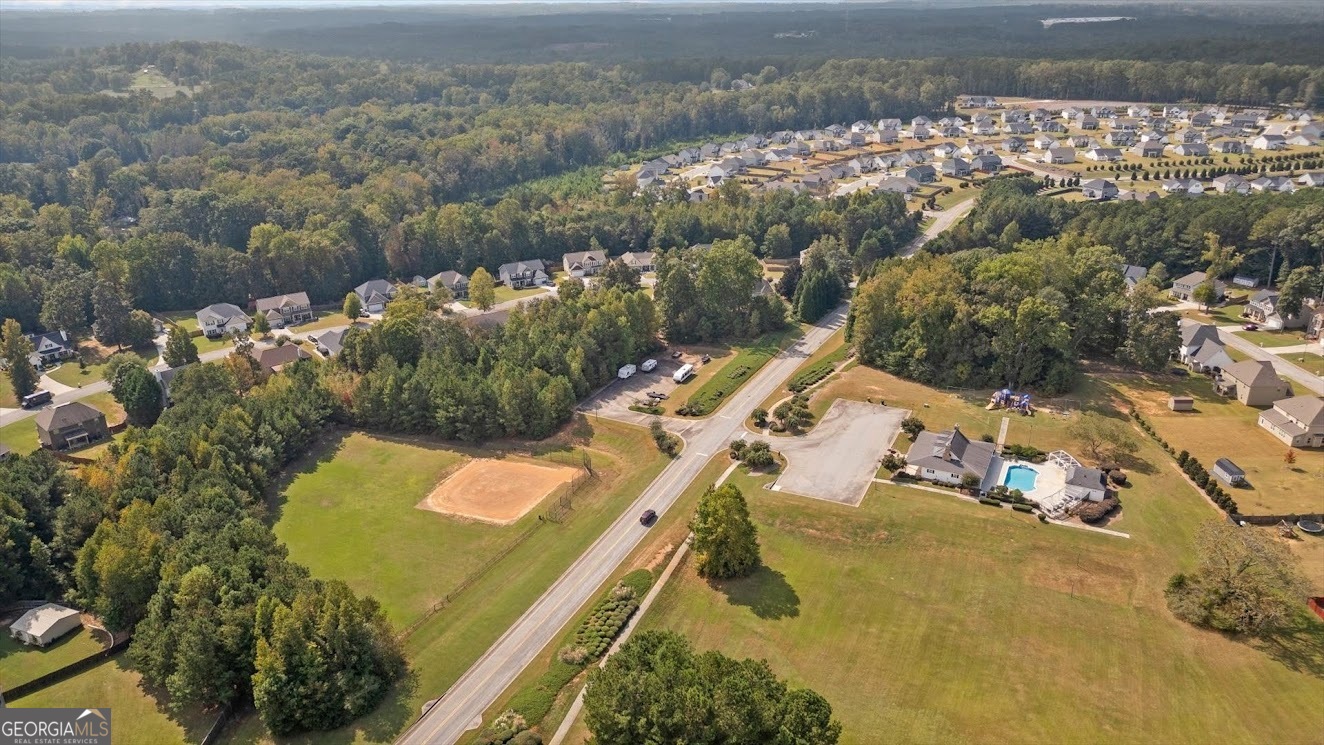 125 Springwood Drive Carrollton, GA 30117 - Photo 38 of 48 view of a lake with a mountain