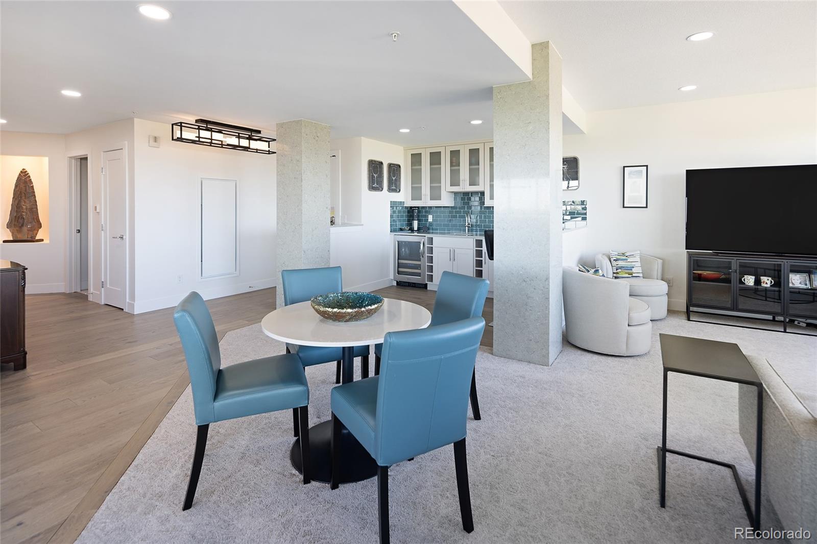 1650 Fillmore Street, Unit 1107 Denver, CO 80206 - Photo 7 of 49 a view of a dining room with furniture