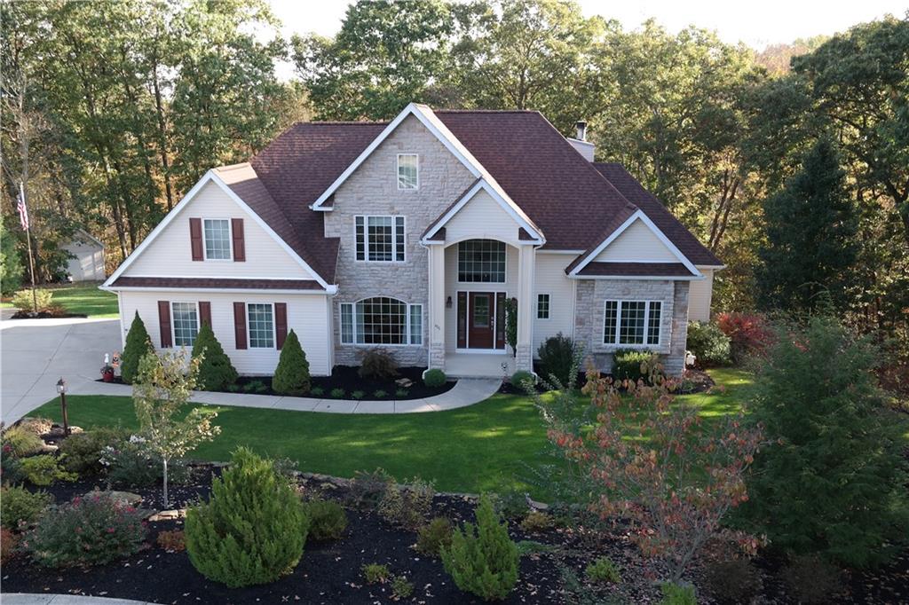 425 Rolling Hills Road Freedom, PA 15042 - Photo 1 of 25 Nestled on nearly 3 acres of mature trees and privacy is this custom build at 425 Rolling Hills Road in Economy.