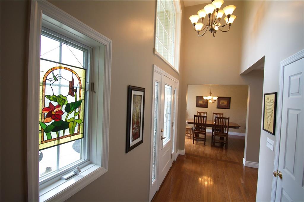 425 Rolling Hills Road Freedom, PA 15042 - Photo 2 of 25 The two story foyer is bright and features a palladium window, beveled entry door with sidelights and hardwood flooring that carries throughout the main level.
