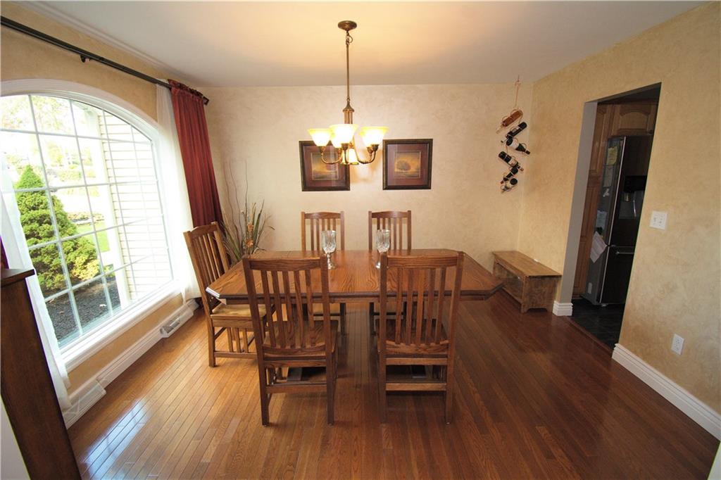425 Rolling Hills Road Freedom, PA 15042 - Photo 3 of 25 The spacious dining room is graced with hardwood flooring and flooded with natural sunlight.