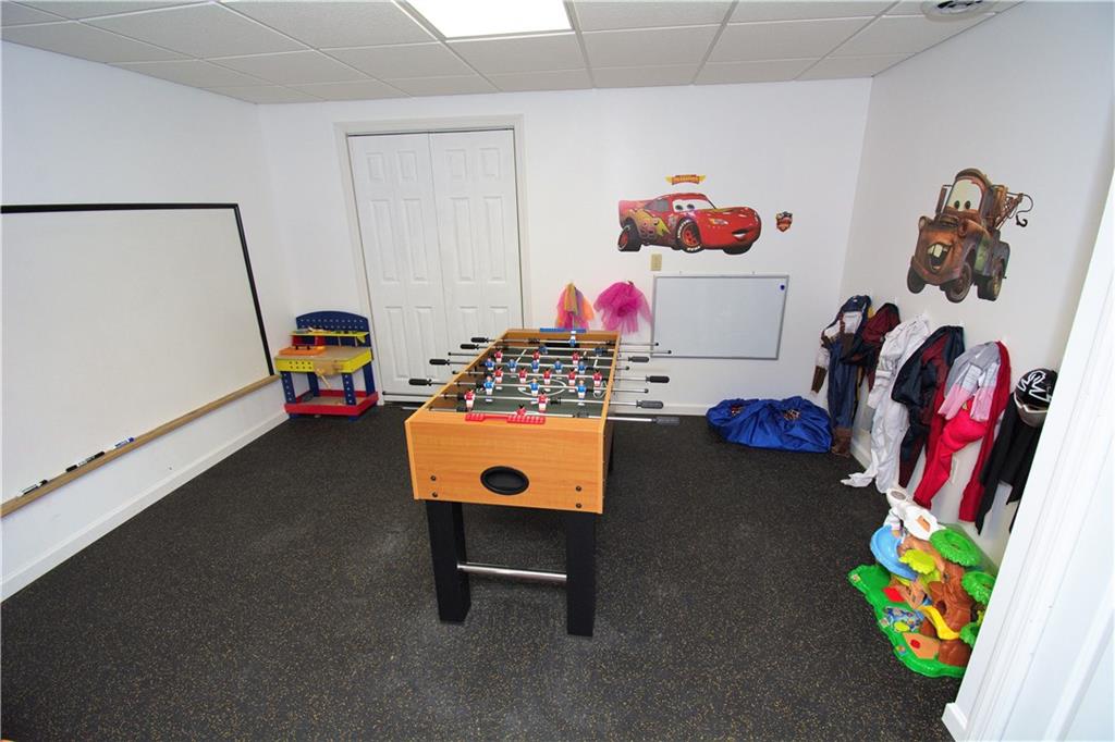 425 Rolling Hills Road Freedom, PA 15042 - Photo 22 of 25 A versatile and spacious room is in the finished lower level. Ready for your design needs.