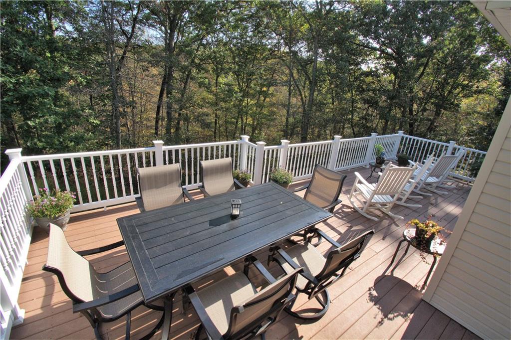 425 Rolling Hills Road Freedom, PA 15042 - Photo 24 of 25 Entertain on the expansive deck and enjoy the serene views of nature.