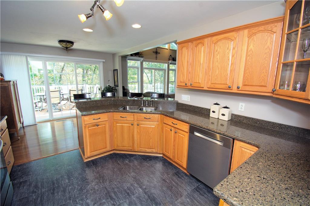 425 Rolling Hills Road Freedom, PA 15042 - Photo 5 of 25 The kitchen is the heart of the home. Featuring generous Quartz counter space and cabinetry for all your meal prep and clean up needs. Access to the back deck is off the kitchen.