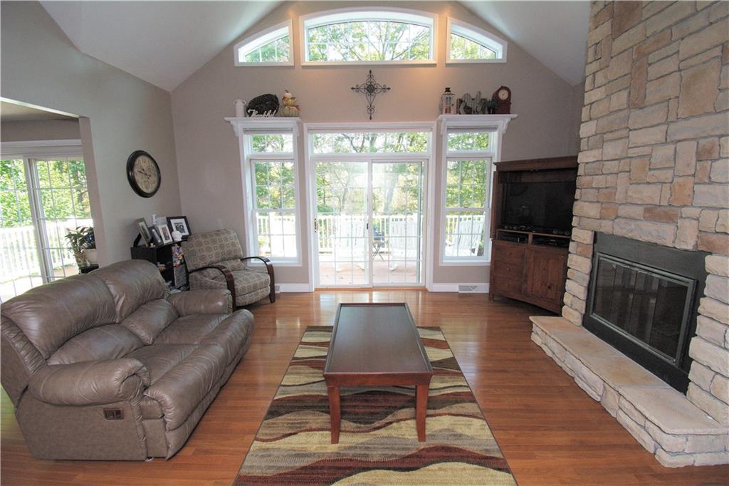 425 Rolling Hills Road Freedom, PA 15042 - Photo 9 of 25 The bright family room features access to the back deck and overlooks the private, wooded homesite.