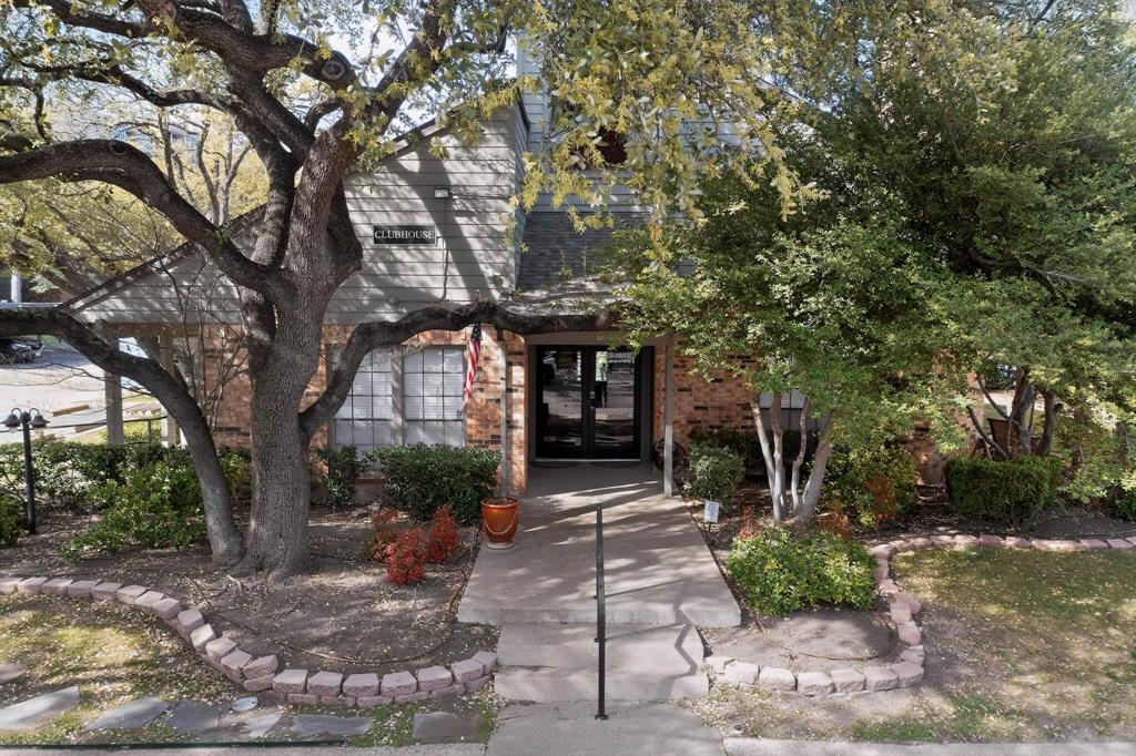 5335 Bent Tree Forest Drive, Unit 237 Dallas, TX 75248 - Photo 30 of 33 a front view of a house with garden