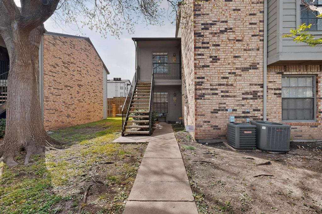 5335 Bent Tree Forest Drive, Unit 237 Dallas, TX 75248 - Photo 3 of 33 a view of a pathway with an empty room