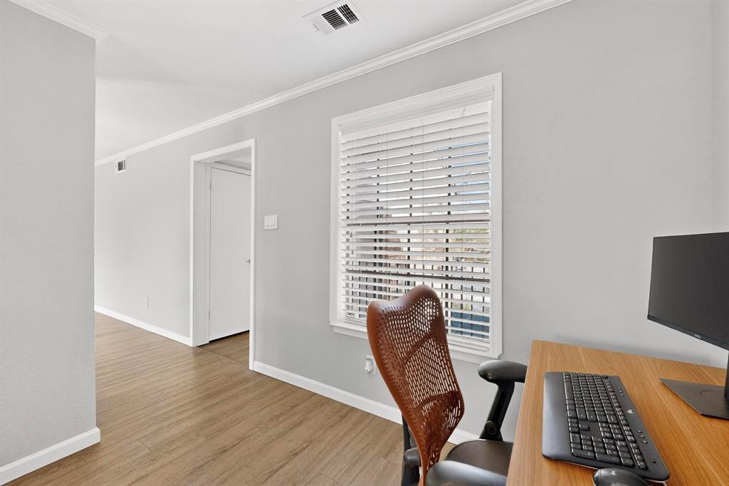 5335 Bent Tree Forest Drive, Unit 237 Dallas, TX 75248 - Photo 9 of 33 a view of a workspace with furniture and a window