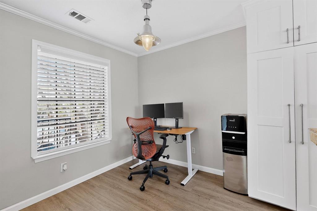 5335 Bent Tree Forest Drive, Unit 237 Dallas, TX 75248 - Photo 10 of 33 a view of a workspace with furniture and a window