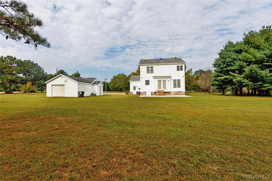 17301 Loving Union Road Disputanta, VA 23842 - Photo 5 of 31 a house view with a garden space