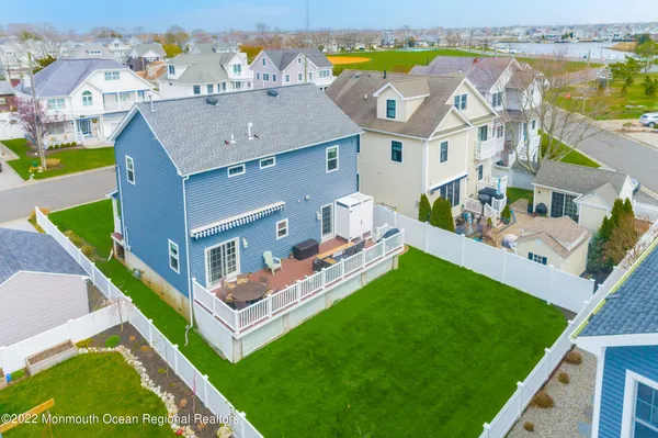 an aerial view of a house with a garden
