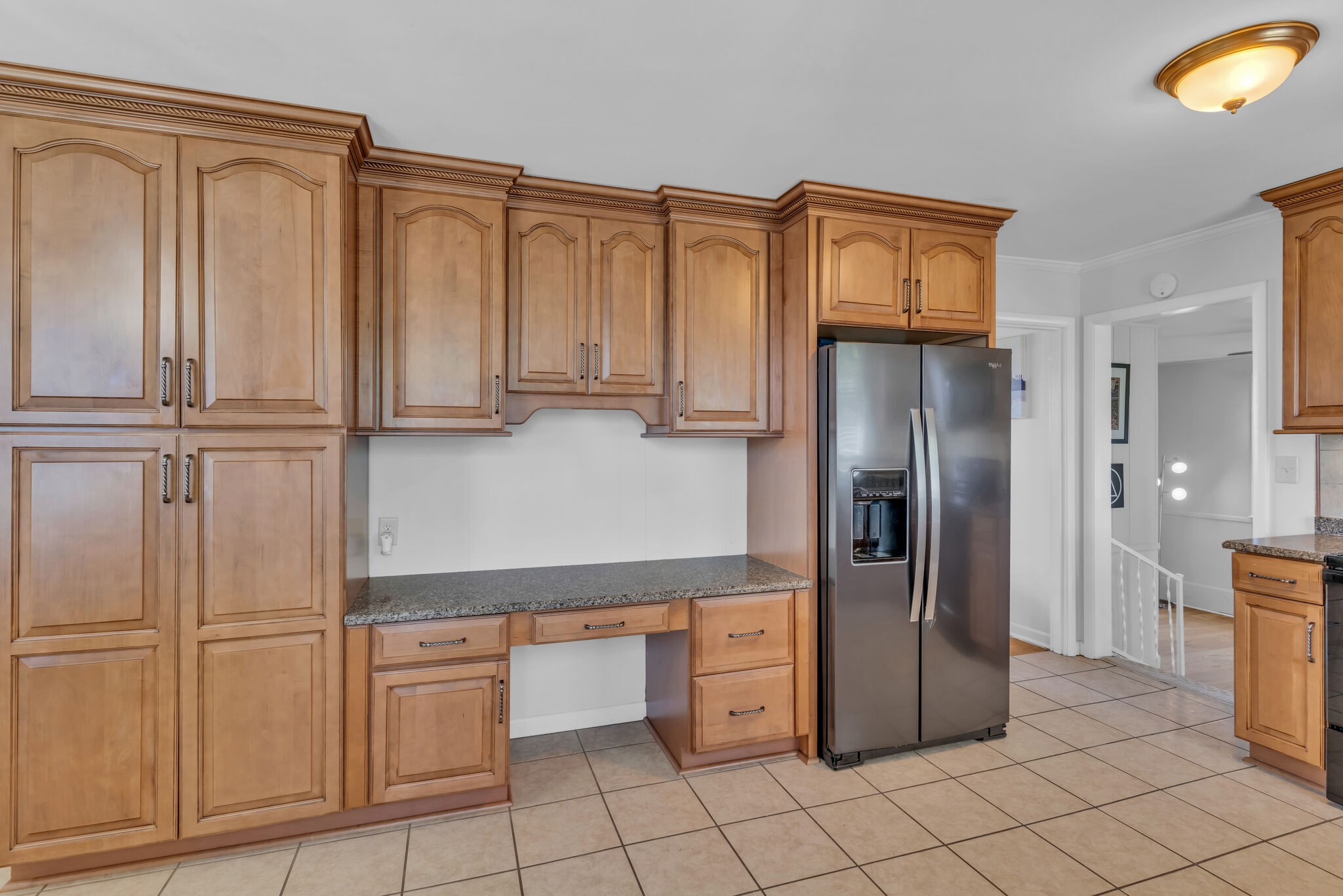 410 Gates Road Goodlettsville, TN 37072 - Photo 12 of 31 a kitchen with stainless steel appliances granite countertop a refrigerator and cabinets