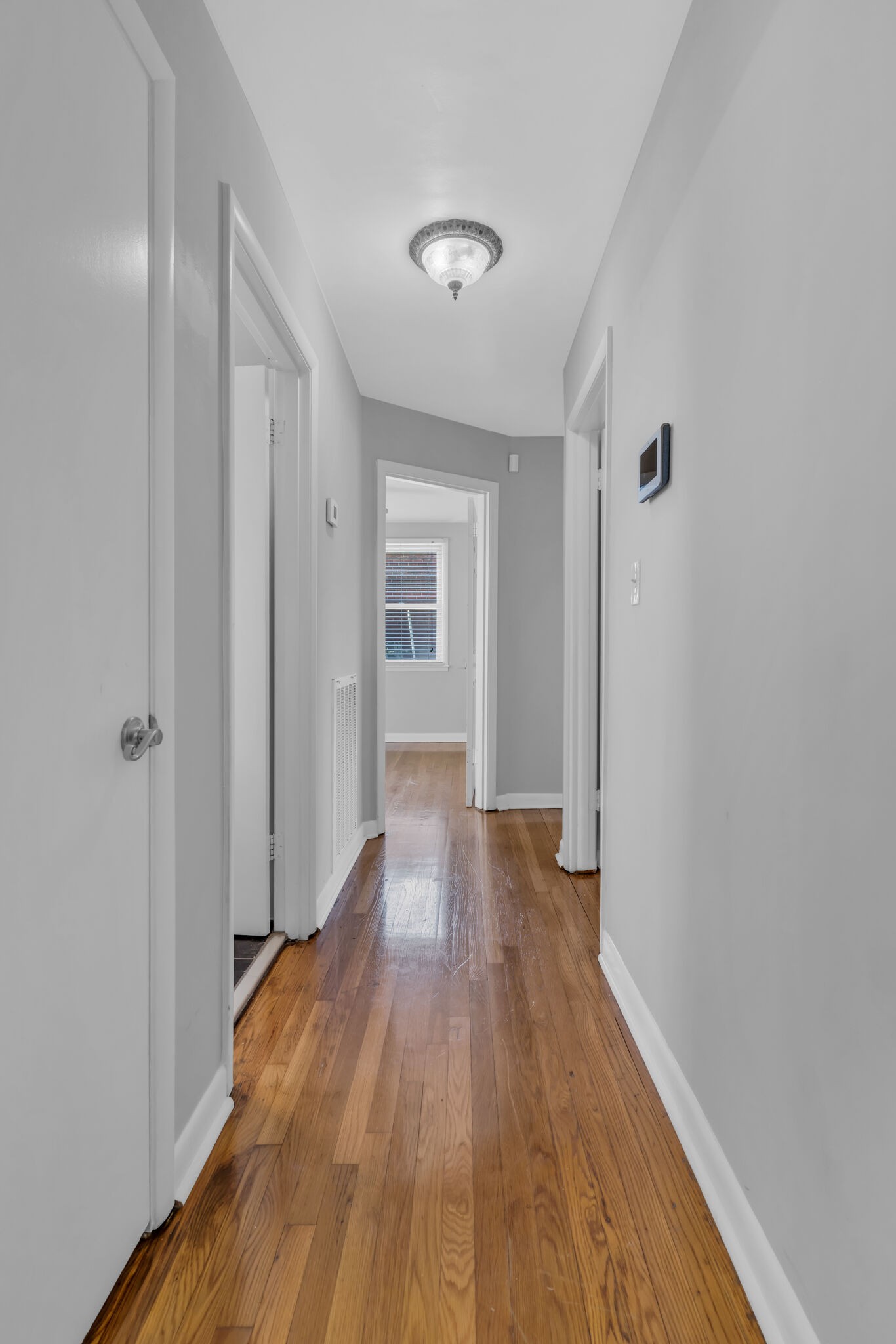 410 Gates Road Goodlettsville, TN 37072 - Photo 14 of 31 a view of a hallway with wooden floor