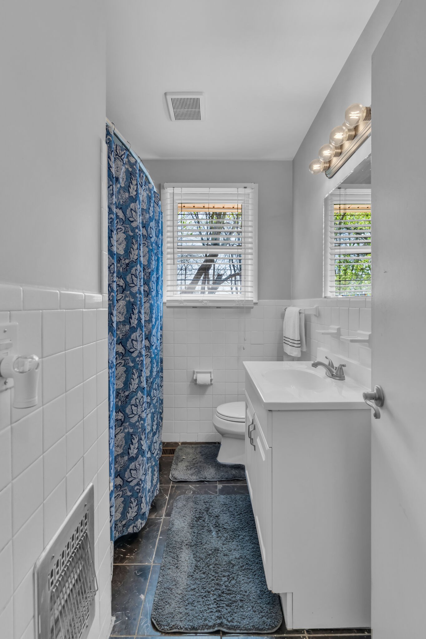 410 Gates Road Goodlettsville, TN 37072 - Photo 15 of 31 a bathroom with a sink and a mirror