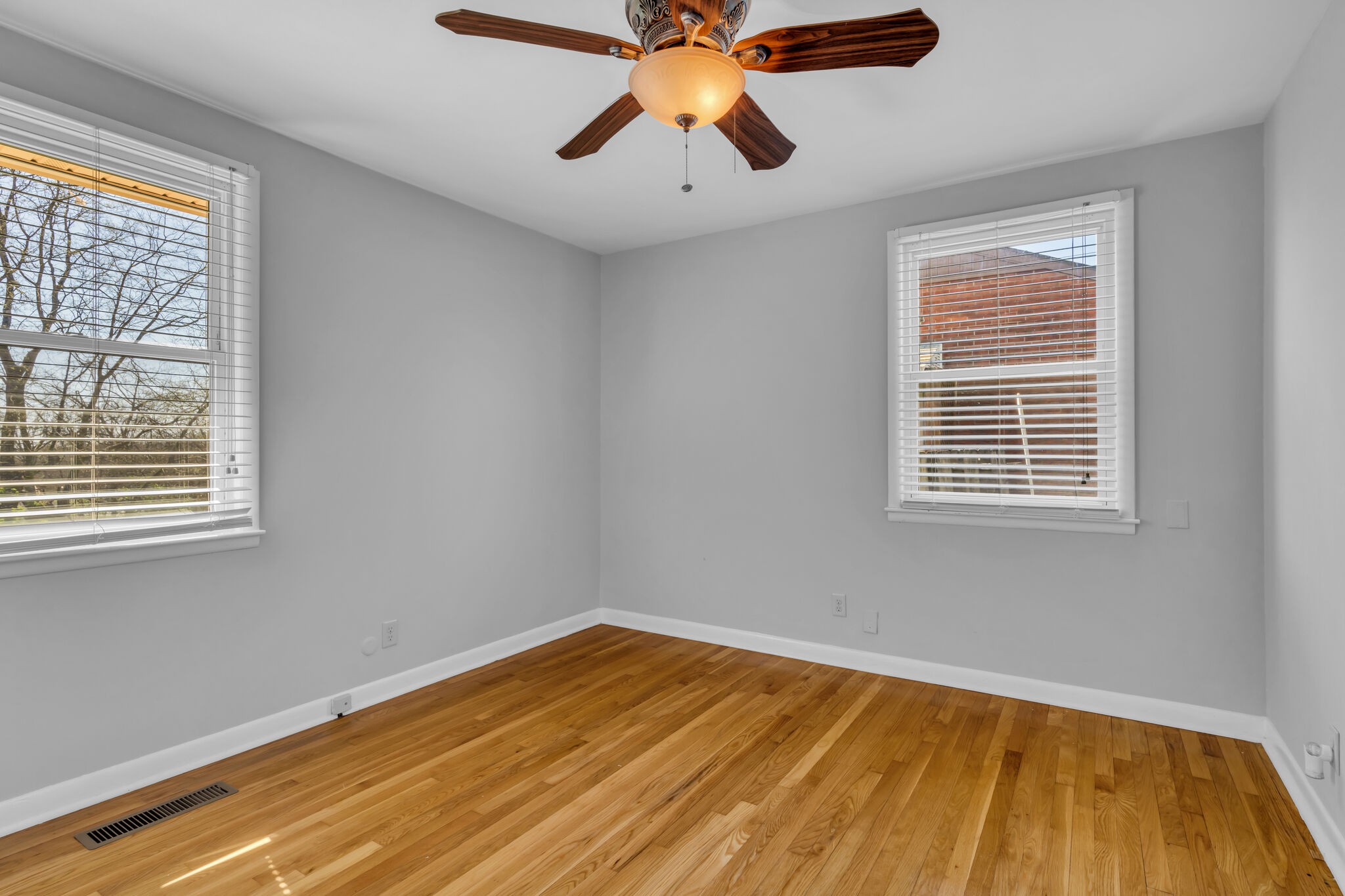 410 Gates Road Goodlettsville, TN 37072 - Photo 18 of 31 a view of empty room with window and wooden floor
