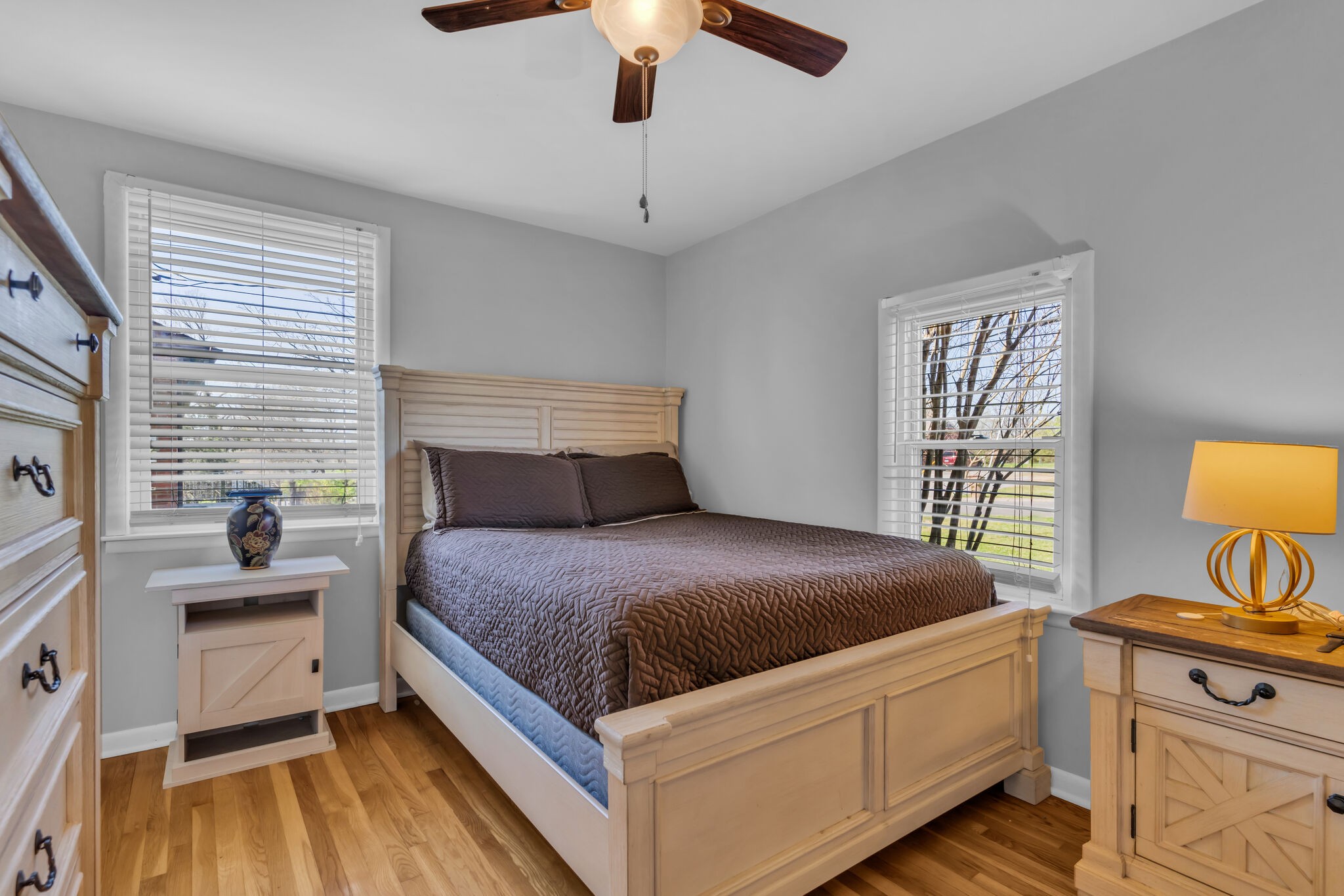 410 Gates Road Goodlettsville, TN 37072 - Photo 21 of 31 a bedroom with a bed and a flat tv screen on dresser