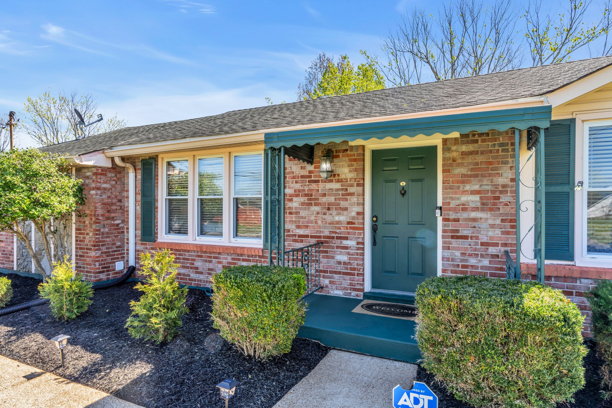 410 Gates Road Goodlettsville, TN 37072 - Photo 4 of 31 a front view of a house with garden