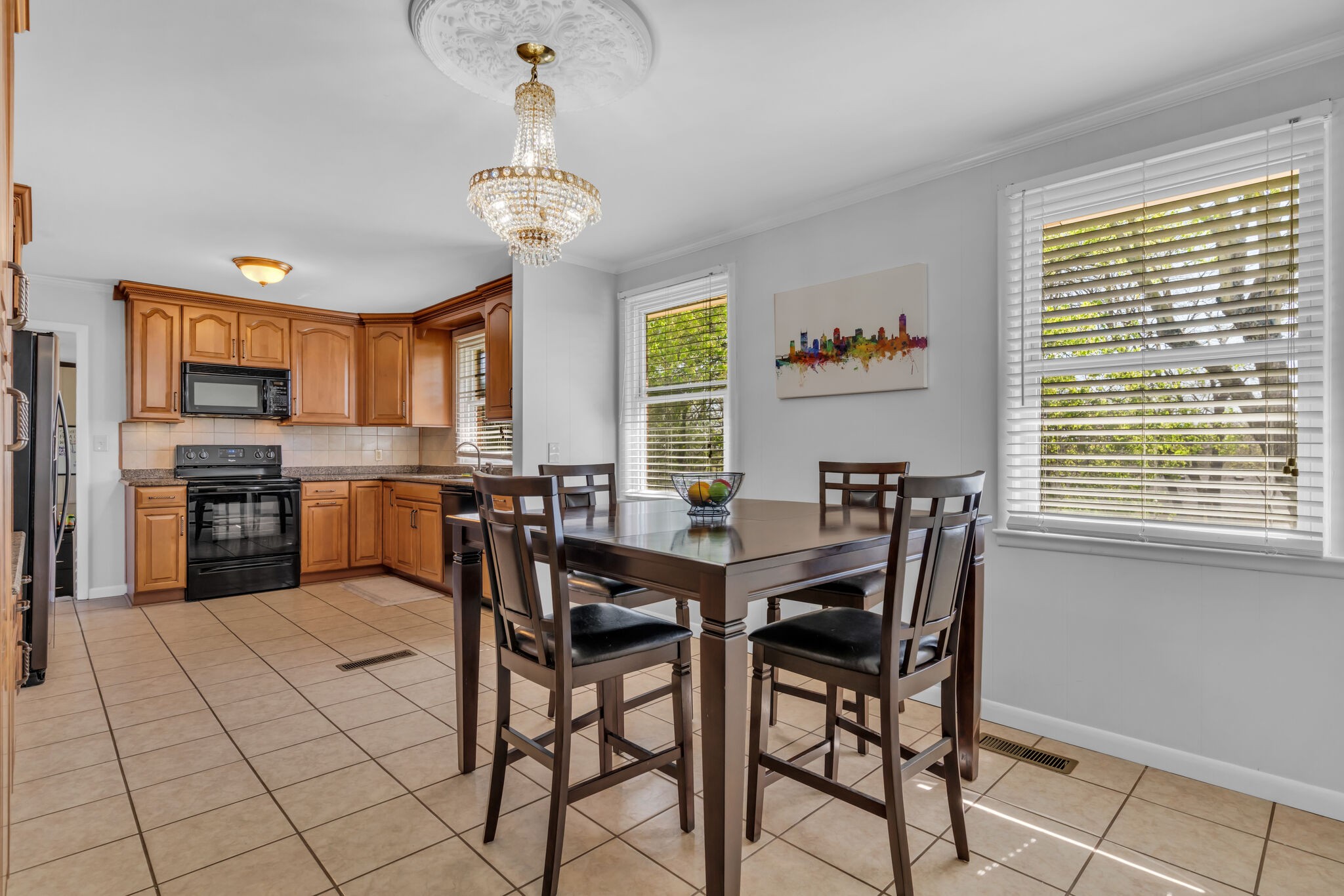 410 Gates Road Goodlettsville, TN 37072 - Photo 9 of 31 a view of a dining room with furniture and a chandelier