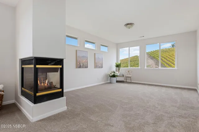 a bedroom with a bed and a potted plant