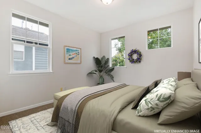 a view of a house with a yard and deck