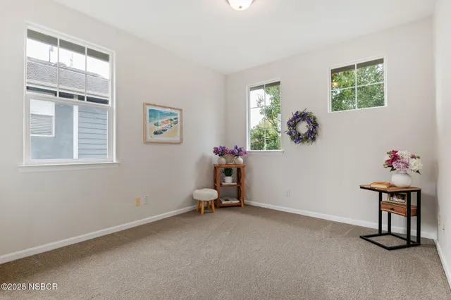 a aerial view of a house with a garden and plants