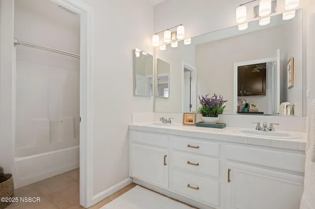 an aerial view of a house with a garden