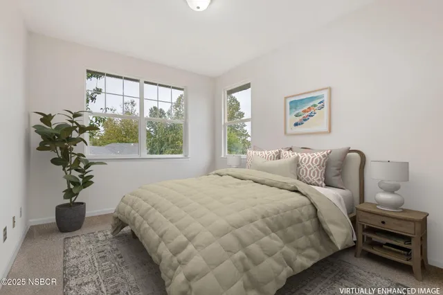 an aerial view of a house with a swimming pool