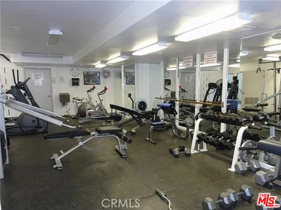 7777 West 91st Street, Unit E2143 Playa del Rey, CA 90293 - Photo 14 of 21 a view of a room with gym equipment