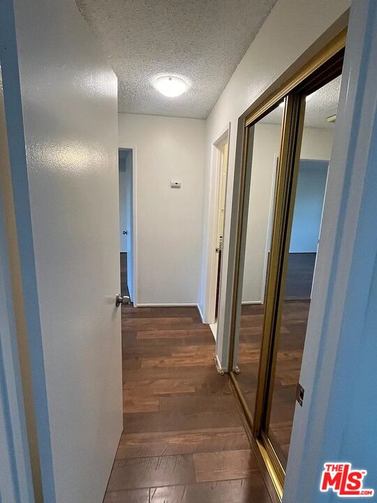 7777 West 91st Street, Unit E2143 Playa del Rey, CA 90293 - Photo 6 of 21 a view of a hallway
