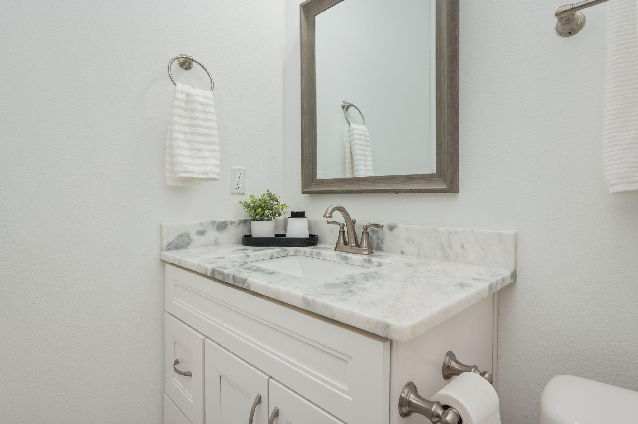 667 Red Fern Road Crestview, FL 32536 - Photo 22 of 43 a bathroom with a sink and a mirror