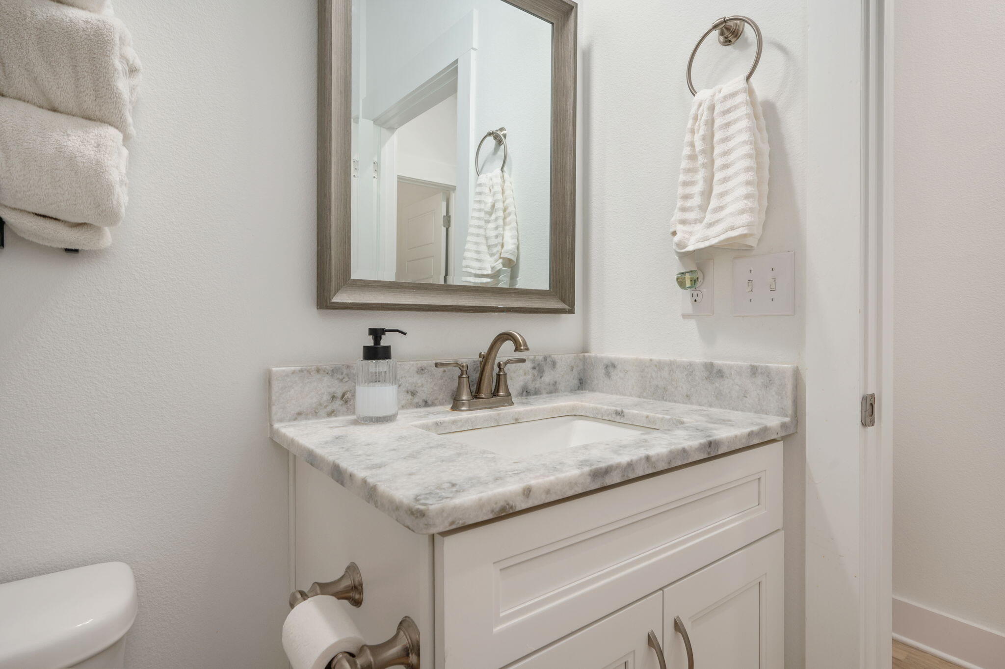 667 Red Fern Road Crestview, FL 32536 - Photo 29 of 43 a bathroom with a granite countertop sink and a mirror