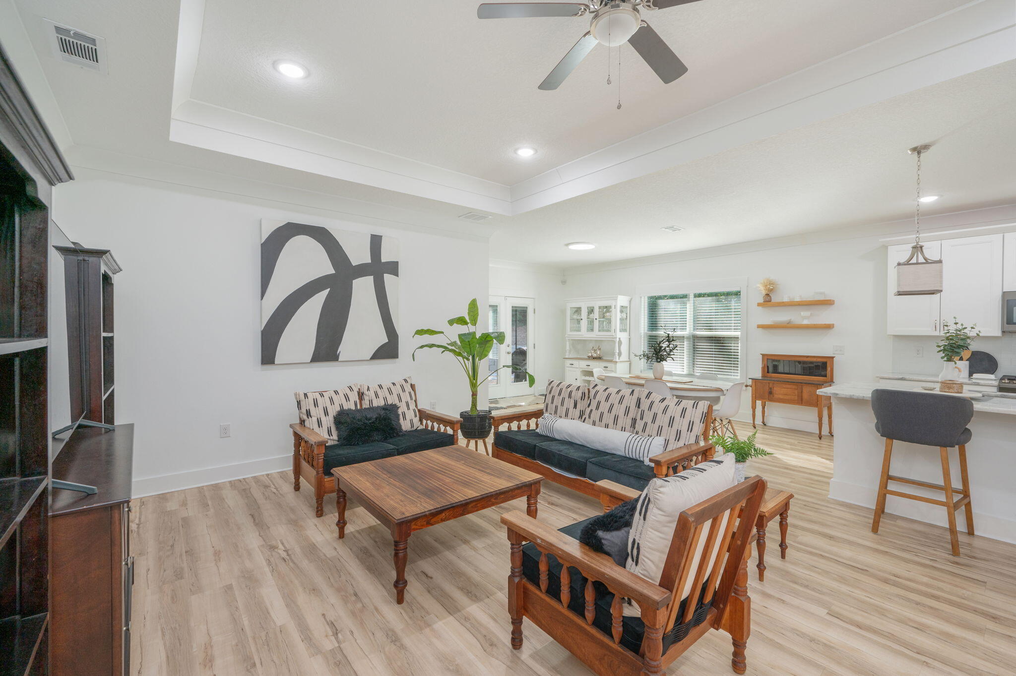 667 Red Fern Road Crestview, FL 32536 - Photo 7 of 43 a living room with furniture a rug and a flat screen tv