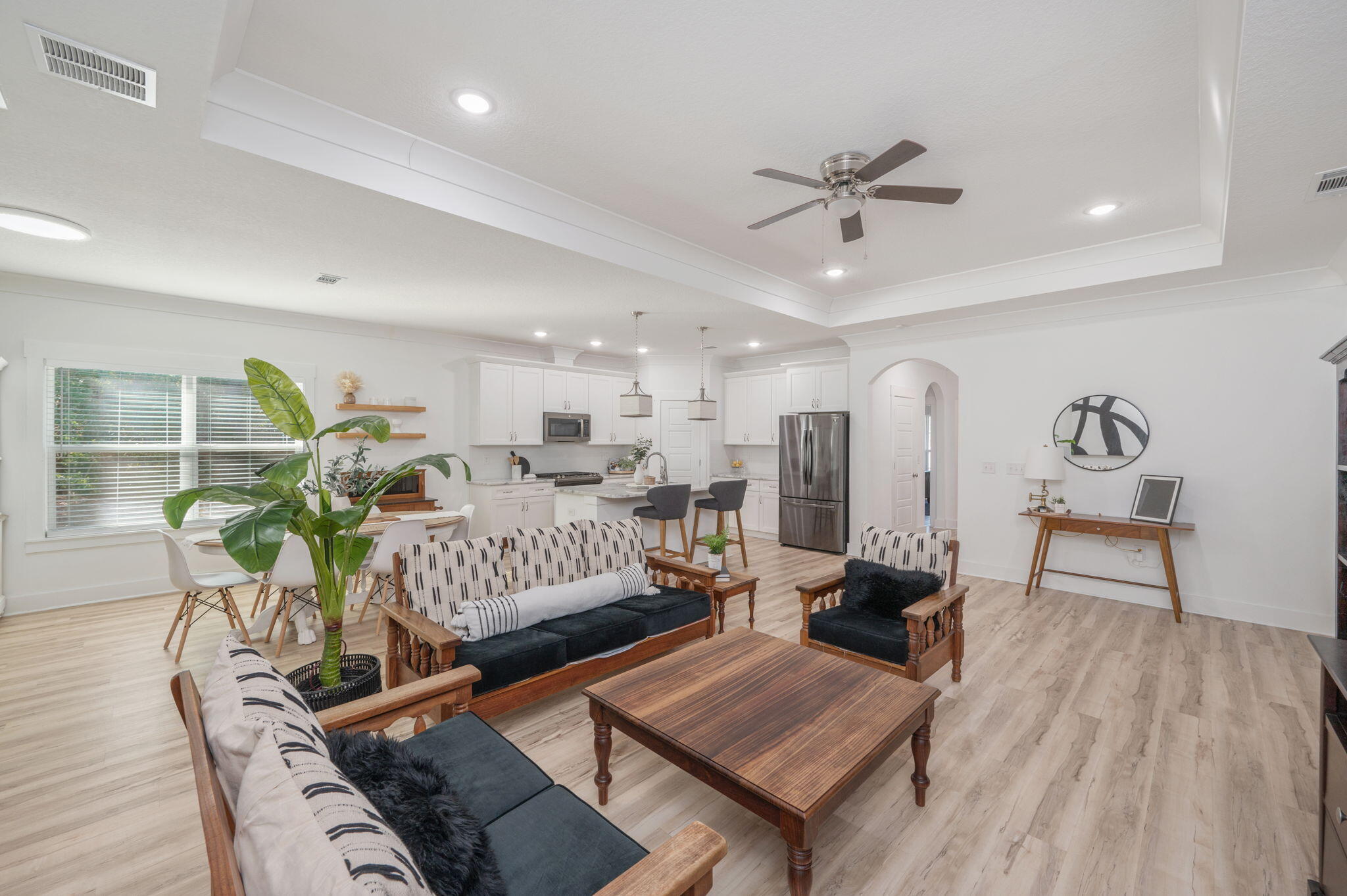 667 Red Fern Road Crestview, FL 32536 - Photo 8 of 43 a living room with furniture and wooden floor