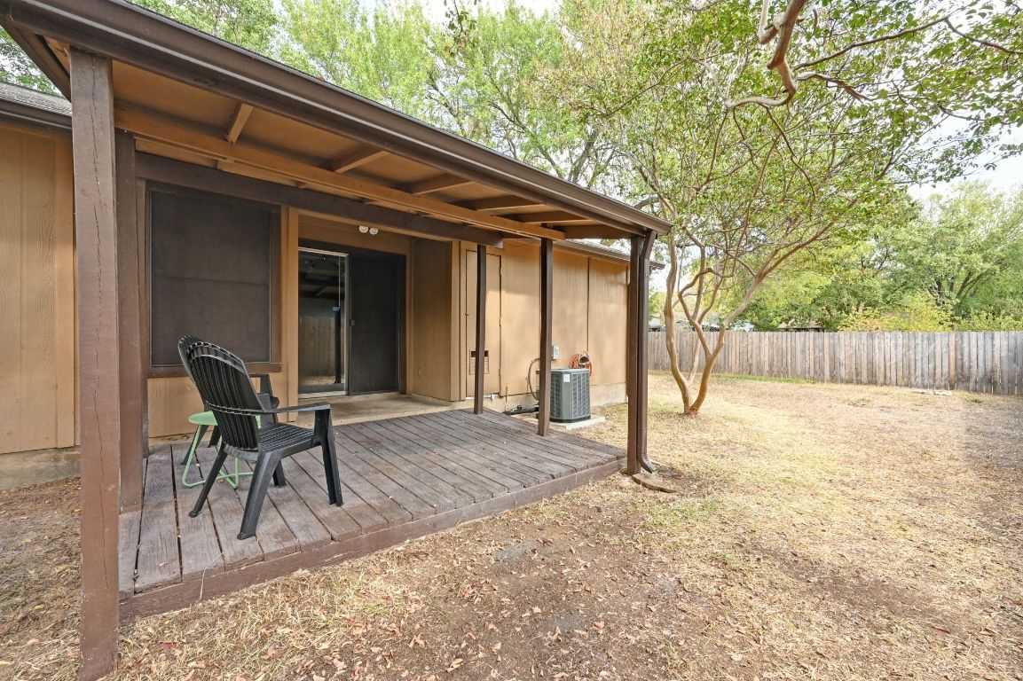 9711 Curlew Drive Austin, TX 78748 - Photo 17 of 21 a backyard of a house with table and chairs