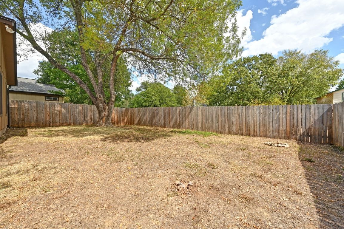 9711 Curlew Drive Austin, TX 78748 - Photo 18 of 21 a backyard of a house