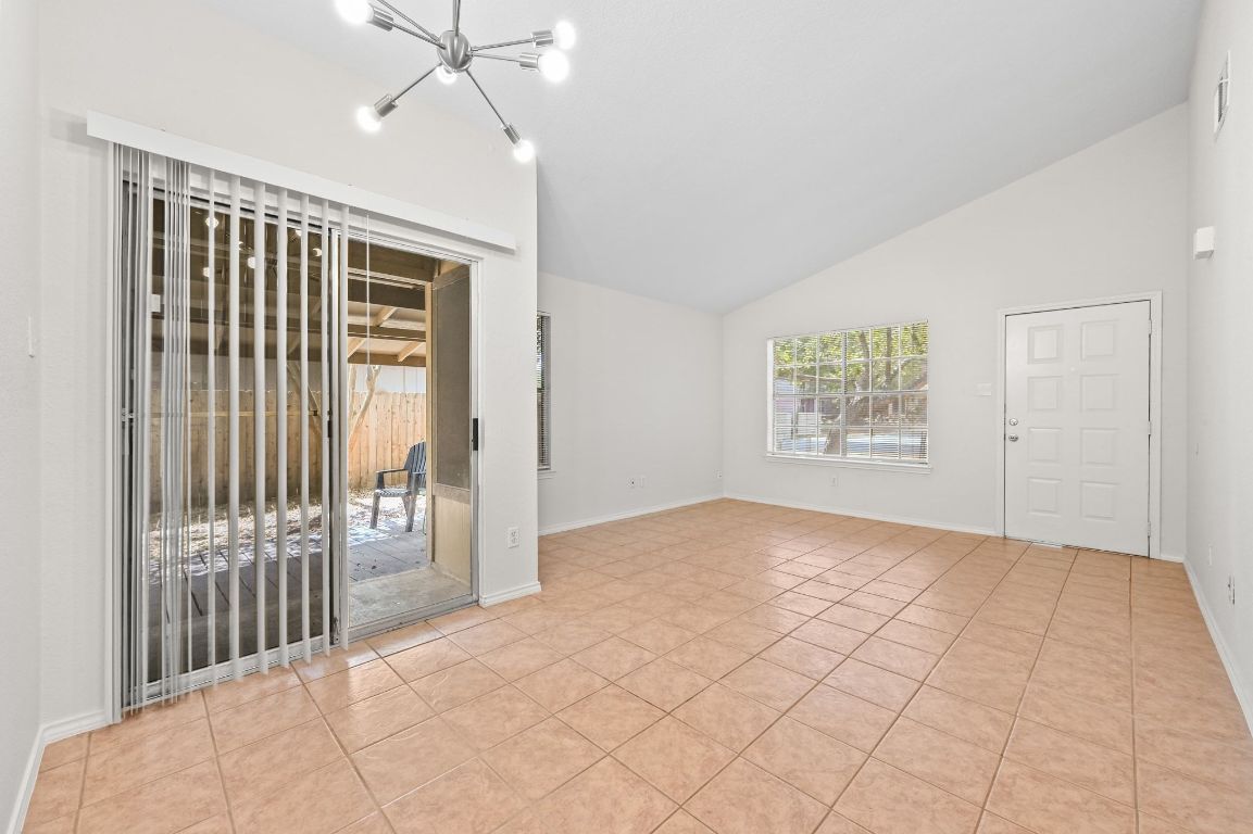 9711 Curlew Drive Austin, TX 78748 - Photo 7 of 21 an empty room with windows