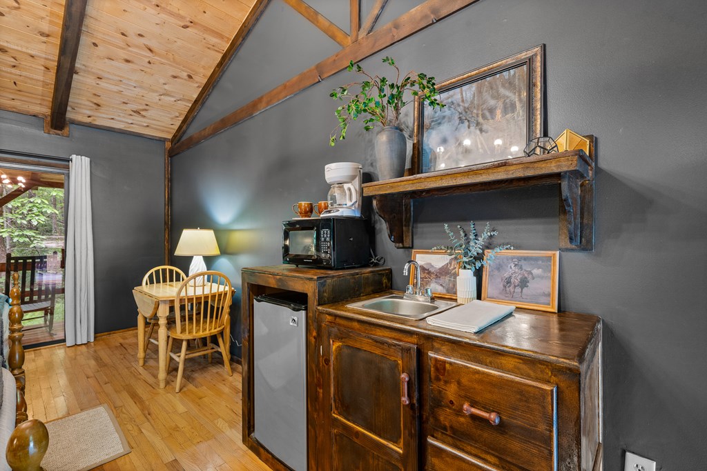 3573 Highway 356 Sautee Nacoochee, GA 30571 - Photo 33 of 53 a room with furniture and wooden floor