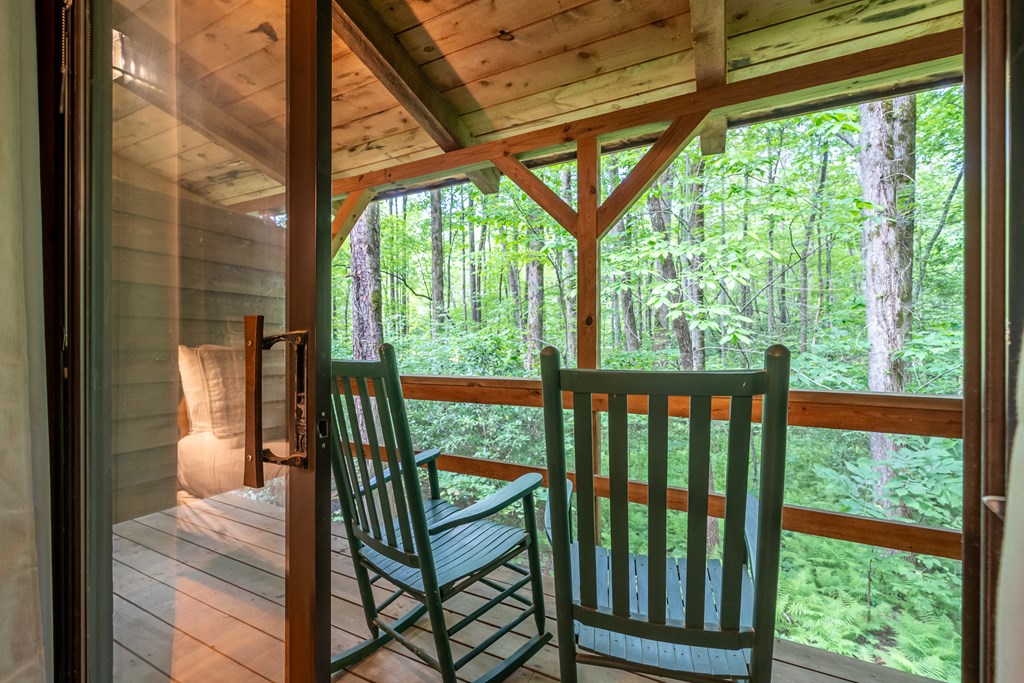 3573 Highway 356 Sautee Nacoochee, GA 30571 - Photo 40 of 53 a view of bedroom with a bed and balcony
