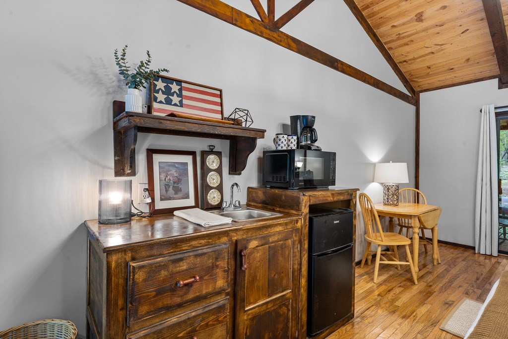 3573 Highway 356 Sautee Nacoochee, GA 30571 - Photo 45 of 53 a kitchen with a stove and a table